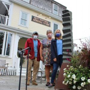 Robbie Campbell of Campbell Marine, Elizabeth Evans of the East Boothbay General Store, and Patricia Royall of Sculpture Boothbay post installation. Sophie West photo