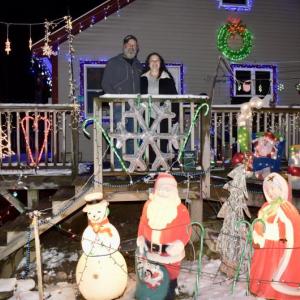 Dennis and Vicki Mosier pose outside their home off Old Stage Road, Woolwich. PHIL DI VECE/Wiscasset Newspaper