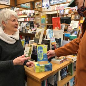 Marilyn Heise discusses her new book with customer Dick Palmer at Sherman’s, Boothbay Harbor. Courtesy photo