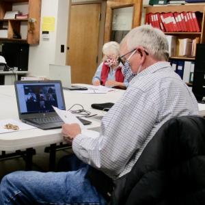 The Woolwich Select Board reviews a 2021-2022 funding request from the Patton Free Library. PHIL DI VECE/Wiscasset Newspaper