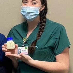 Rebecca Harvey, RN holds a bottle from the first order of donor breast milk received at Miles Maternity recently. Courtesy of LincolnHealth