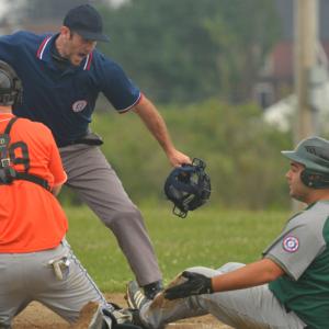 Midcoast Umpire Association of Maine umpire Lee Smith makes the out call in a Babe Ruth baseball game. (File photo/Ron Hawkes)