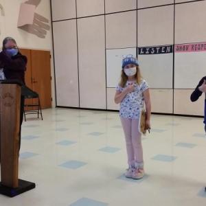 Bee Master Nancy Rose led the Edgecomb Eddy School Spelling Bee Feb. 26 which saw fourth grader Jillian Murray, center, claim the title. Fourth grader John Cooper is also pictured. Courtesy photo