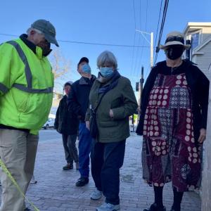 From left, Wiscasset Ordinance Review Committee Chair Karl Olson, Wiscasset Art Walk’s Lucia Droby, ORC member Donald Oyster, Lincoln County Regional Planning Commission Executive Director Mary Ellen Barnes and Appearance of the Town Committee and Friends of Wiscasset Village member Terry Heller measure and walk Main Street’s sidewalks March 29. SUSAN JOHNS/Wiscasset Newspaper
