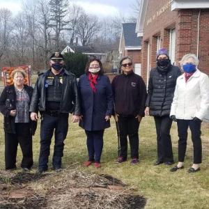 Attending the flag-raising ceremony are, from left, Sara Fahnley, Chief Larry Hesseltine, Audrey Miller, Vivian Waltz, Clara Wentworth and Susann Hochstein. Bruce Hutchins photo