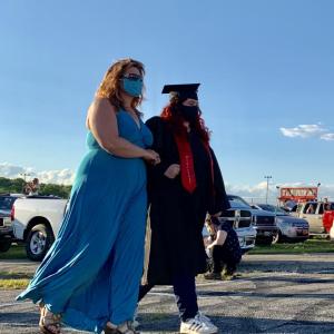 Wiscasset School Committee’s Desiree Bailey escorts daughter Gabrianna Bailey to “Pomp and Circumstance” at Wiscasset Speedway June 12, 2020. File photo