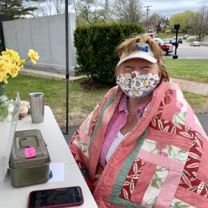Wiscasset’s Jan Flowers helps man the bake sale at Garden Club of Wiscasset’s annual plant sale at the town office May 8. SUSAN JOHNS/Wiscasset Newspaper