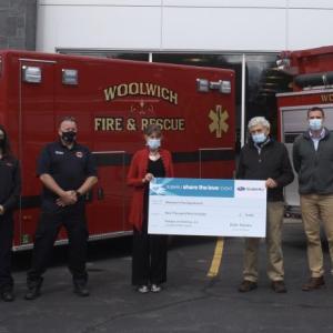 From left at the May 11 presentation are Robert Nibarger of WFD/EMS, Sienna Mazone (EMS), Fire Chief Mike Demers, Jane McElman (Bath Subaru), Bath Subaru owner Richard McElman Jr., Blake McElman (Bath Subaru), and selectmen Allison Hepler and Jason Shaw. Courtesy photo