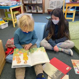 CTL reading buddies enjoy reading new books together. Courtesy of CTL