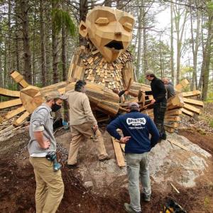 The CMBG and Bristol Marine teams and working on one of Thomas Dambo’s creations. Robert Mitchell photo