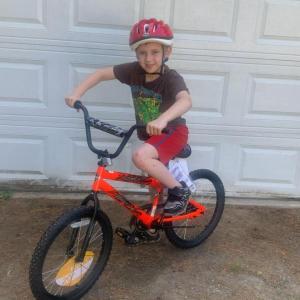 Tanner Davis and his new bike. Courtesy of Doug Davis
