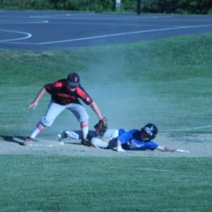 Midcoast slugger David Frazee tries turning a double into a triple June 16 against Brunswick, but was thrown out at third base. BILL PEARSON/Boothbay Register