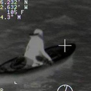 Gulf of Mexico West of Clearwater, FL, April 11, 2016, 10 p.m. local time: An infra-red still image taken from a Coast Guard helicopter video showing a 17-year-old girl being rescued after four hours adrift after she lost her paddle due to a boat wake and became separated from her companions, disoriented and hypothermic. US Coast Guard photo.