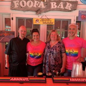Brady’s Pub in Boothbay Harbor is one of the few businesses not impacted by the labor shortage. Other businesses face closing down one to two days per week due to not enough labor. Pictured: Executive Chef Stan Hornsby, bartender Kristen Senior, owner Jen Mitchell and Front of House Manager Shane McBay. BILL PEARSON/Boothbay Register