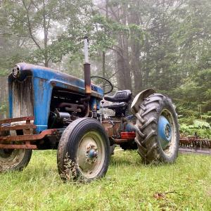Classic tractor now used for road grading