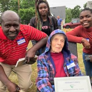 Distinguished Service award recipient Jean Perkins with family members of some of her students from her more than 20 years as a Midcoast Literacy tutor. Katie Clark photo