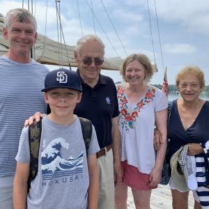 Beside the docked 1939, Wiscasset-built schooner When and If in Wiscasset Aug. 21 are Virginia’s Greg Terry, son Jake Terry, Greg’s father Denny Terry, Greg’s sister Susie Terry and Denny’s fiancee Patricia Stauble of Edgecomb. SUSAN JOHNS/Wiscasset Newspaper