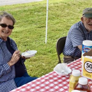 Lloyd and Collette Coombs volunteered to help and got to sample the Hennins’ homemade ice cream. PHIL DI VECE/Wiscasset Newspaper