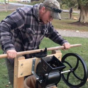 Making sweet apple cider with an old-fashioned press at Coastal Rivers Salt Bay Farm. Courtesy of Coastal Rivers