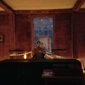 A skeleton sits behind the judge’s bench in a cobweb-filled and candlelit eerie courtroom. Courtesy of LCHA