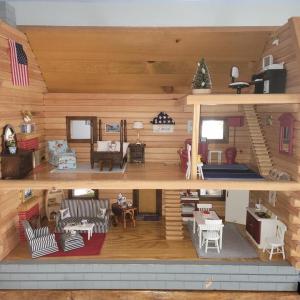The finished dollhouse being offered as a raffle prize. Courtesy of Audrey Miller