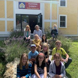 Author Jennifer Jacobson visits with campers to talk craft last summer. Courtesy of Stephanie McSherry
