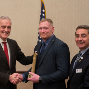 Acting MBVS Deputy Director Steven Lanning, center, is awarded the 2022 VA’s Pillar of Excellence by the Honorable Denis McDonough, United States Secretary of Veterans Affairs, left, NASDVA President, Thomas Palladino - Texas Veterans’ Commission Executive Director, right. Courtesy photo