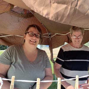 Lucy Oyster-Ackerman and her mother Bette Oyster set up a treats table at a cookout May 20 at Wiscasset’s community playground. SUSAN JOHNS/Wiscasset Newspaper