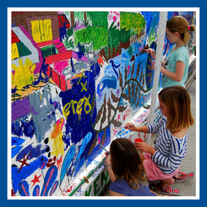 Painting a mural at the Merry Barn. Courtesy photo