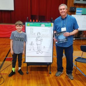 Matt Travares with WES fourth grader Levi Stinson Freeman. Michaela West photo