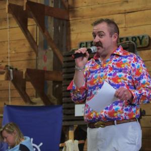 Master of Ceremonies Michael Maxim makes an announcement at Claw Down. Bob Crink photo