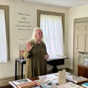Exhibit organizer Alice Smith Duncan leads a tour of LCHA’s exhibit, Women Writers of Lincoln County, at the Old Jail in Wiscasset. Courtesy photo