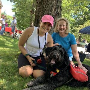 Kathryn Fedus and mother Kathleen Quirion enjoy last year’s Summerfest with Quirion’s Newfoundland-poodle (Noodle) Brooke, one of the winners in the 2021 dog parade. File photo