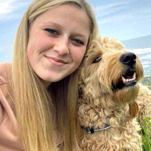 Paris Pierpont with her dog. Courtesy photo