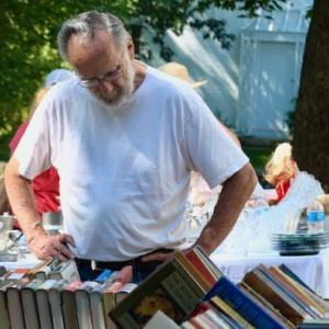So many books, so little time at Summerfest, the annual; yard sale.