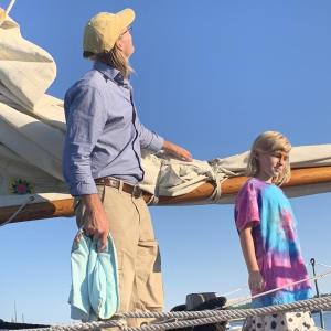 Wiscasset Selectman Dusty Jones and daughter Addie Bova Jones, 8, check out When and If Aug. 19. SUSAN JOHNS/Wiscasset Newspaper