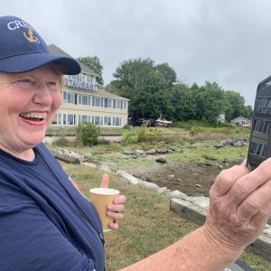 Wiscasset’s Jan Flowers checks out the image of Hesper and Luther Little Aug. 18. SUSAN JOHNS/Wiscasset Newspaper