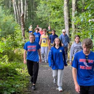 The Boothcasset cross country team walks the Waldoboro trail ahead of the annual preseason Panther Two-miler. Courtesy photo