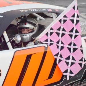 PJ Merrill with the checkered flag. Peter Taylor photo