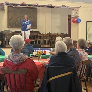 Westport Island Democrats chair and emcee of the event Barbara Cray explains the importance of “plan to vote.” Courtesy photo