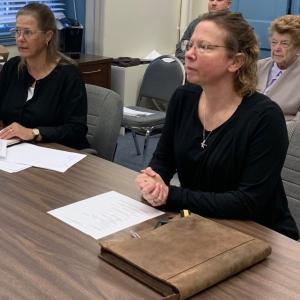 Lincoln County Communications Director Tara Doe, right, meets with commissioners Sept. 20. Also pictured, County Administrator Carrie Kipfer. BILL PEARSON/Boothbay Register