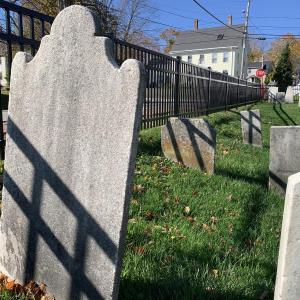 The midday sun Oct. 19 and the new, $53,500 fence make line shadows on gravestones at Ancient Cemetery. SUSAN JOHNS/Wiscasset Newspaper