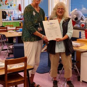 State Rep. Allison Hepler presents WES teacher Trae Stover with the Legislature’s congratulations Oct. 19 for Stover’s being named Lincoln County teacher of the year earlier this year. Courtesy photo