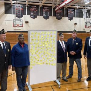 American Legion members with the stars middle school students made to honor service members. EDNA MILLER/Wiscasset Newspaper