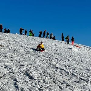 Over 150 people of all ages took advantage of the new snow for sledding at Coastal Rivers Salt Bay Farm on Saturday, Jan. 21. Courtesy of Diane Frank