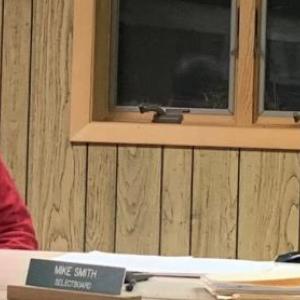 Edgecomb selectmen Ted Hugger, left, and Mike Smith discuss a proposal Jan. 24 to make sand available at the town garage for residents. BILL PEARSON/Boothbay Register