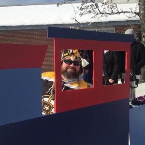 Robert MacDonald outside Wiscasset Community Center at Winterfest 2016, with the train decoration he made for a cocoa station. File photo