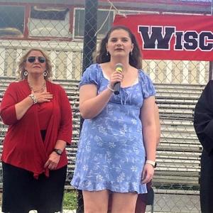 Then-junior Carolyn Potter sings the National Anthem at the WMHS Class of 2022’s graduation. File photo