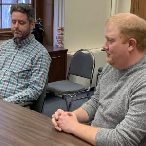 At the March 21 commissioners’ meeting, County Emergency Management Agency Director Casey Stevens, right, and Central Maine Power’s Ben Voit discuss their joint efforts in restoring power during the recent snowstorms. BILL PEARSON/Boothbay Register