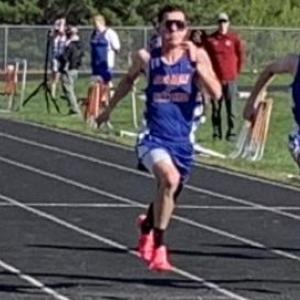 Boothbay/Wiscasset runner Aidric Canada, center, finished first in the 100M and teammate Austin Trask, to Canada’s left, finished second in the May 9 Mountain Valley Conference track meet in Wiscasset. BILL PEARSON/Boothbay Register